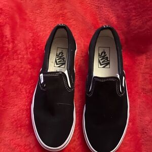 Vans Men's Black and White Slip-On Sneakers